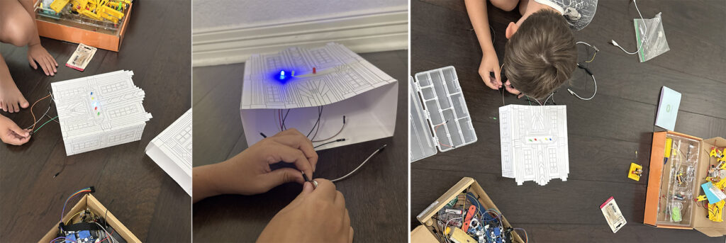 Testing small LED lights inside an Art Deco paper building to explore the idea of illuminating the city from within.